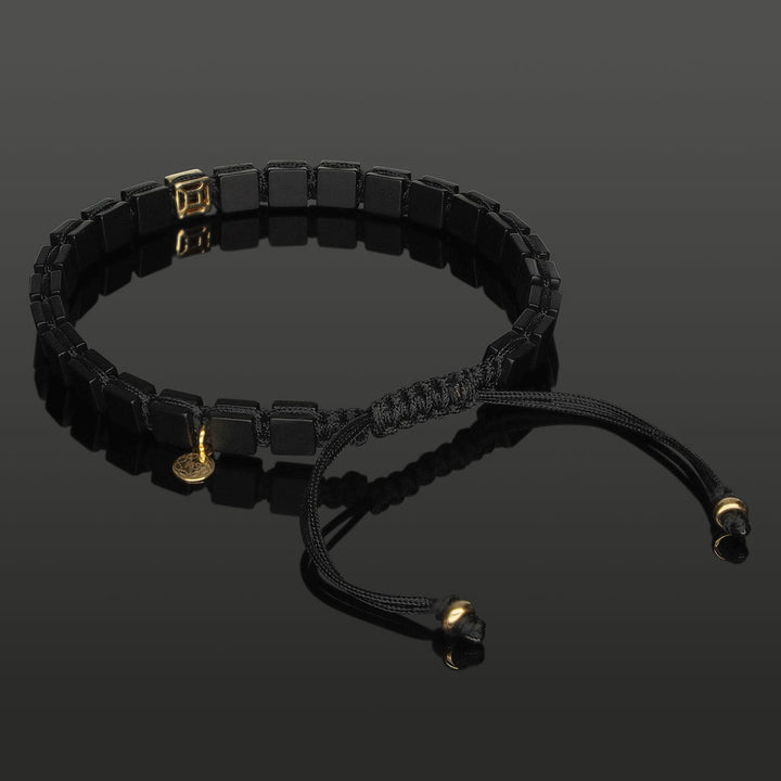 Edelstein-Armband mit 4 schwarzen Diamanten in 585 Gelbgold &amp; SkyBlock Onyx in 6mm