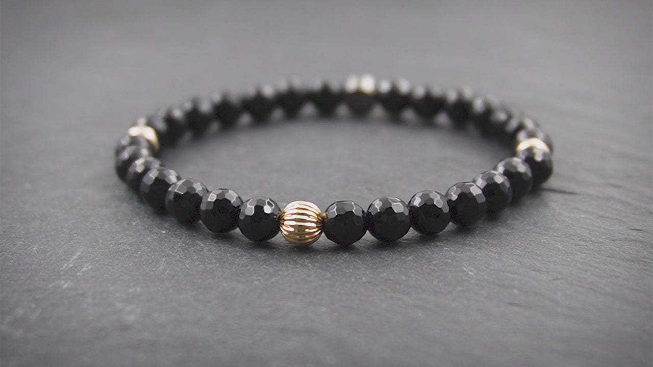 Damen Perlenarmband aus funkelnd facettiertem Onyx & 9 Karat Gold in 6mm