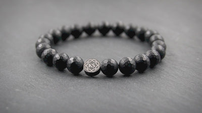 Perlenarmband aus matt facettiertem Onyx